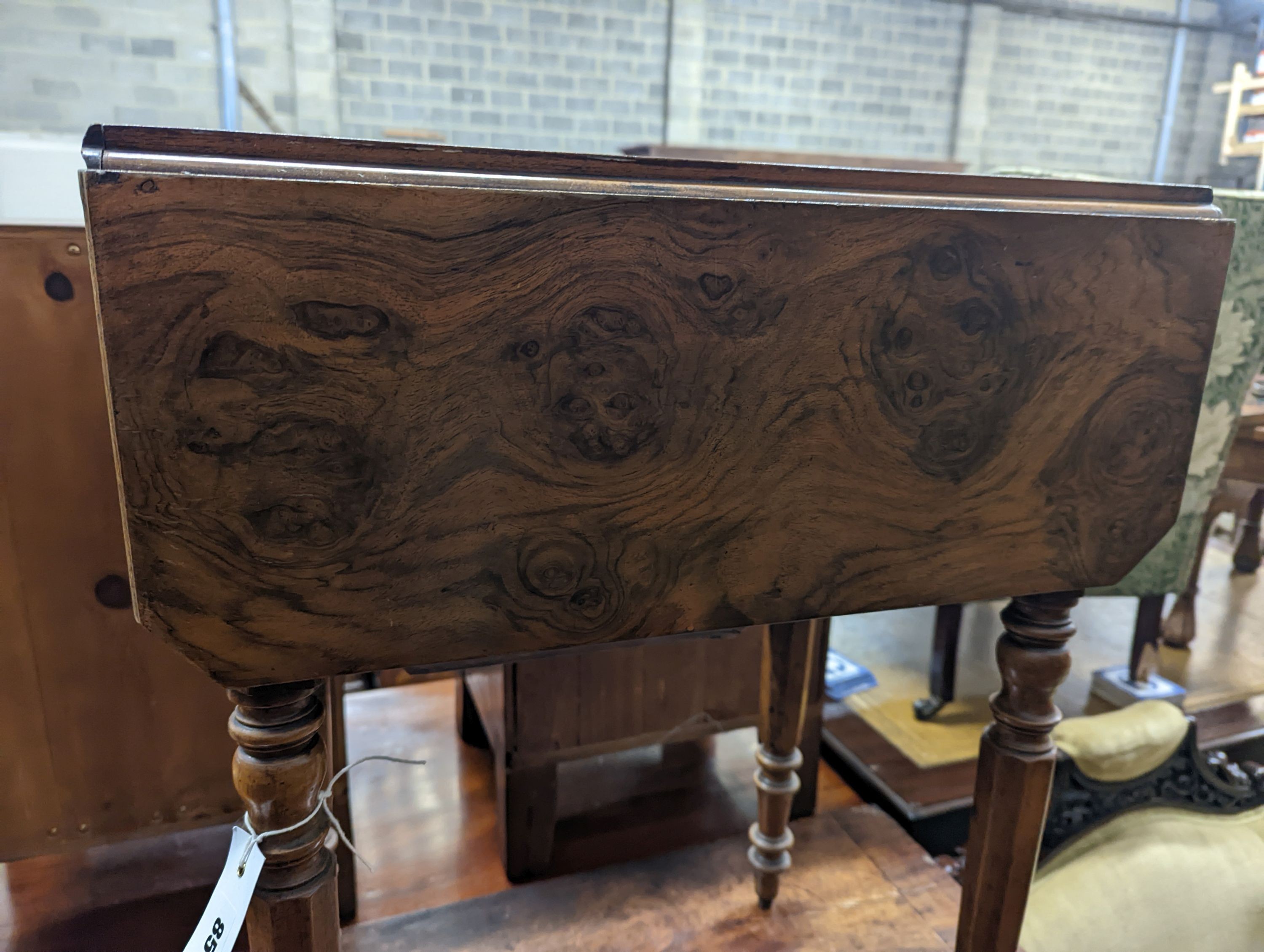 A 19th century French walnut drop flap work table, width 51cm, depth 36cm, height 68cm